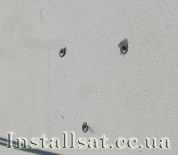 Anchor bolts fully recessed into the holes